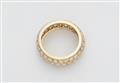 An 18k gold and diamond eternity ring - image-2