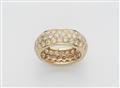 An 18k gold and diamond eternity ring - image-1