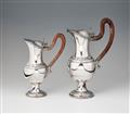 A pair of Augsburg silver wine pitchers - image-1