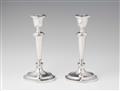 A pair of St. Petersburger silver candlesticks - image-1