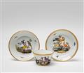 A cup and two saucers with Continental birds - image-1