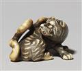 An ivory netsuke of a tiger. First half 19th century - image-1