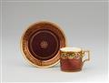 A Vienna porcelain cup and saucer with gilt arabesques - image-1