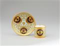 A Vienna porcelain cup and saucer with gold cornucopia motifs - image-1