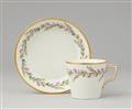 A Berlin KPM porcelain cup and saucer with rose tendrils - image-1