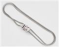 An 18k white gold necklace with a ruby clasp - image-2