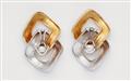 A pair of 18k white and yellow gold earclips - image-2