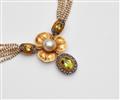 An 18k gold and natural pearl necklace with a coloured stone pendant - image-2