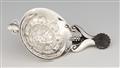 A silver tea strainer by Georg Jensen, model no. 98 - image-1