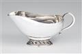 A small silver sauce boat by Georg Jensen, model no. 435 - image-1