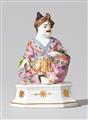 A rare Meissen porcelain figure of a seated male pagode - image-1