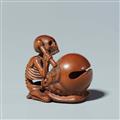 A wood netsuke of a skeleton with a bell. First half 19th century - image-1