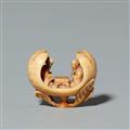 An ivory netsuke of go players in a peach. First half 19th century - image-1