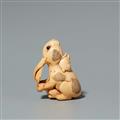 An ivory netsuke of a mother hare with her young. First half 19th century - image-3
