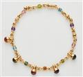 An 18k gold Bulgari gemstone necklace - image-1