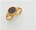 A 22k gold two-finger ring with a late Roman intaglio - image-1