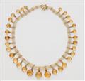 A pearl necklace with citrine pendants - image-2
