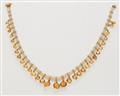 A pearl necklace with citrine pendants - image-1