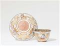 An "émail de Saxe" tea bowl and saucer - image-2