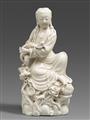 A blanc de Chine figure of a seated Guanyin. Qing dynasty - image-1