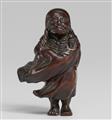 A finely carved netsuke of Daruma. Mid-19th century - image-1