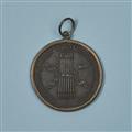 A cast iron medallion inscribed “Einigkeit macht stark” - image-1