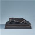 A cast iron ladies hand paperweight - image-1