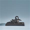 A cast iron swan paperweight - image-2