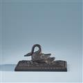 A cast iron swan paperweight - image-1