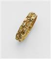 An 18k gold gemstone bangle - image-1