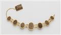 A 21k gold bracelet with scarab amulets - image-2