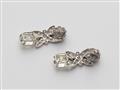 A pair of 14k gold diamond solitaire earrings - image-3