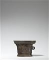 A single-handled mortar with animal motifs - image-2