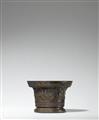 A single-handled mortar with animal motifs - image-1