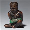 A wood and ivory netsuke of a kappa with a cucumber. 19th century - image-1