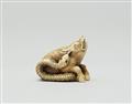 An ivory netsuke of a boar with a snake. Late 19th century - image-2