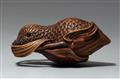 A boxwood netsuke of a flying quail with a millet branch - image-1