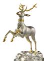 A parcel gilt silver drinking vessel in the form of a stag - image-2