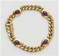 An 18k gold chain bracelet with rubies - image-1