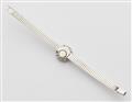 An 18k white gold diamond cocktail wristwatch - image-2