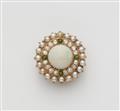 A 14k red and yellow gold opal rosette brooch - image-1