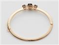 A Belle Epoque 18k red gold sapphire bangle - image-2