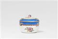 A Meissen porcelain sugar box with wildflowers and a blue ribbon - image-1