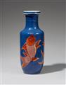 An iron-red decorated powder blue carp rouleau vase. Qing dynasty (1644-1911), 19th century - image-2