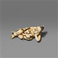 An ivory netsuke of a reclining Okame with a very young boy. Late 18th century - image-1