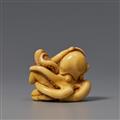 An ivory shunga netsuke of an awabi diver and octopus in amorous embrace. Early 19th century - image-2