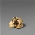 An ivory netsuke of a rat on a tentacle. Around 1900 - image-1