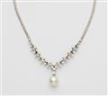 A German 18k gold diamond necklace suspending a South Sea pearl drop. - image-1