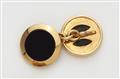 A pair of French 18k gold and onyx cufflinks. - image-2