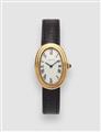 An 18k gold manually wound Cartier Baignoire ladies wristwatch. - image-1
